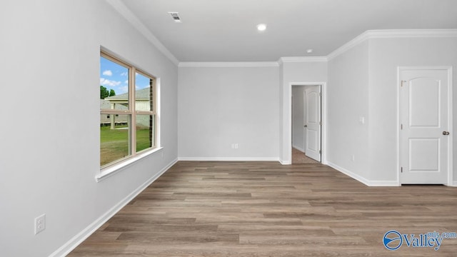 14 Moon Dr, Scottsboro, AL 35769 - unfurnished room with crown molding, wood finished floors, and baseboards