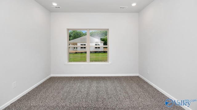 14 Moon Dr, Scottsboro, AL 35769 - unfurnished room with carpet flooring, baseboards, and recessed lighting