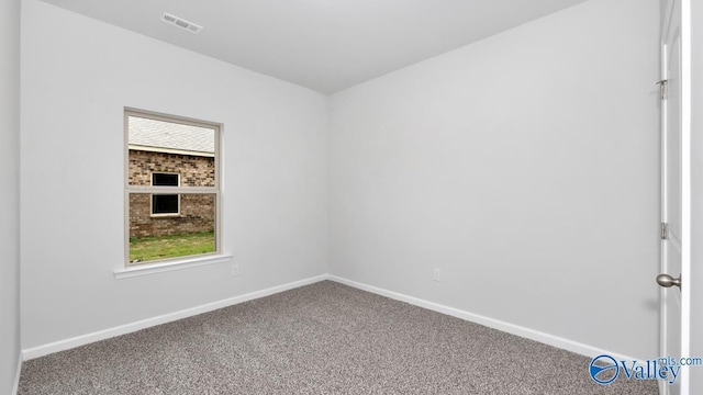 14 Moon Dr, Scottsboro, AL 35769 - spare room with carpet, baseboards, and healthy amount of natural light