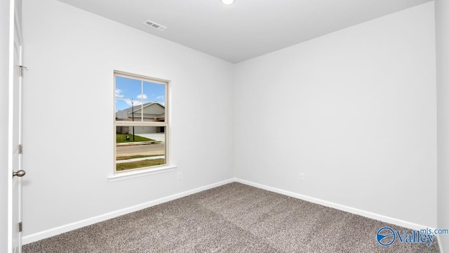 14 Moon Dr, Scottsboro, AL 35769 - unfurnished room with carpet floors and baseboards