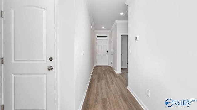 14 Moon Dr, Scottsboro, AL 35769 - hallway featuring crown molding, wood finished floors, baseboards, and recessed lighting