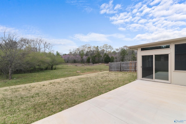 view of yard with fence and a patio area