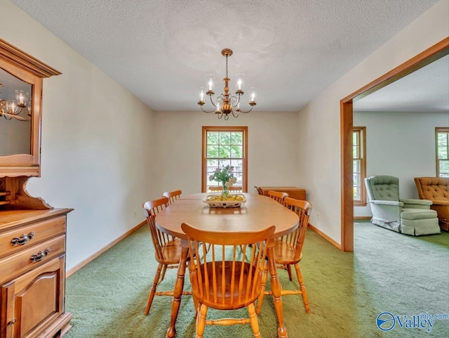 1913 Ruth St, Scottsboro, AL 35769 - dining room featuring a wealth of natural light, a notable chandelier, and light carpet