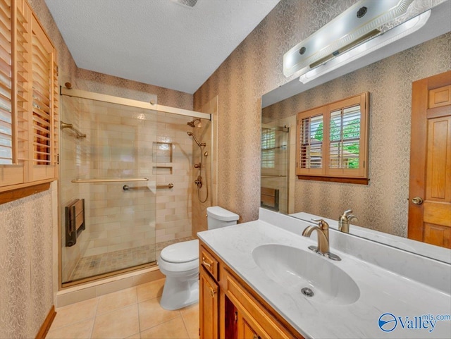 1913 Ruth St, Scottsboro, AL 35769 - full bath featuring toilet, a shower stall, tile patterned flooring, and vanity