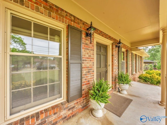 1913 Ruth St, Scottsboro, AL 35769 - entrance to property with a porch and brick siding