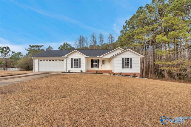 ranch-style home with a garage and a front lawn