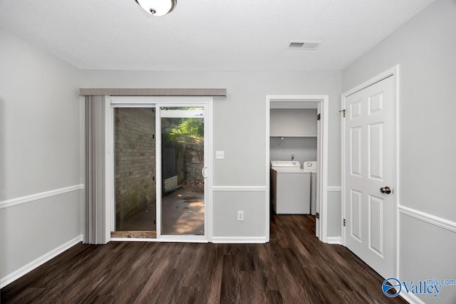 2007B Reaches Pl SW Unit B, Huntsville, AL 35802 - unfurnished bedroom with separate washer and dryer, wood finished floors, baseboards, and a spacious closet