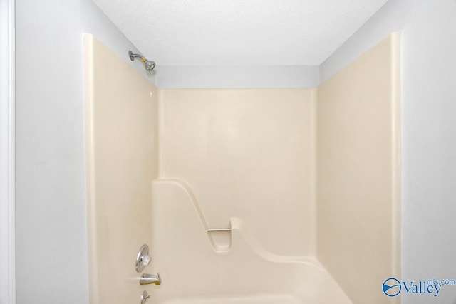 2007B Reaches Pl SW Unit B, Huntsville, AL 35802 - full bathroom with a textured ceiling and shower / bathtub combination