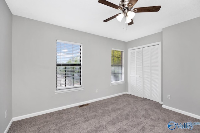 2007B Reaches Pl SW Unit B, Huntsville, AL 35802 - unfurnished bedroom with carpet, a closet, baseboards, and ceiling fan