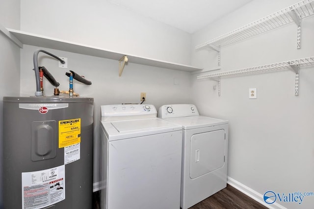 2007B Reaches Pl SW Unit B, Huntsville, AL 35802 - washroom with water heater, dark wood-type flooring, washing machine and clothes dryer, and baseboards