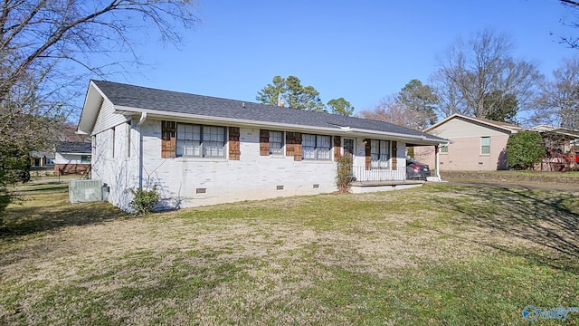 view of front of property with brick siding, a shingled roof, crawl space, central AC, and a front yard