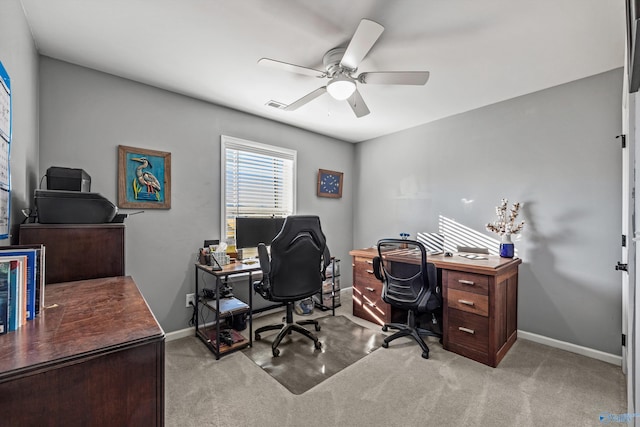 office area with carpet, ceiling fan, visible vents, and baseboards