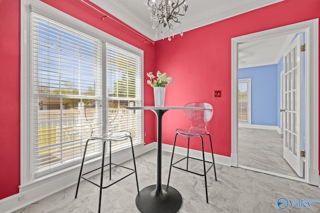 130 Kingswood Dr, Huntsville, AL 35806 - dining room with crown molding, baseboards, and a chandelier
