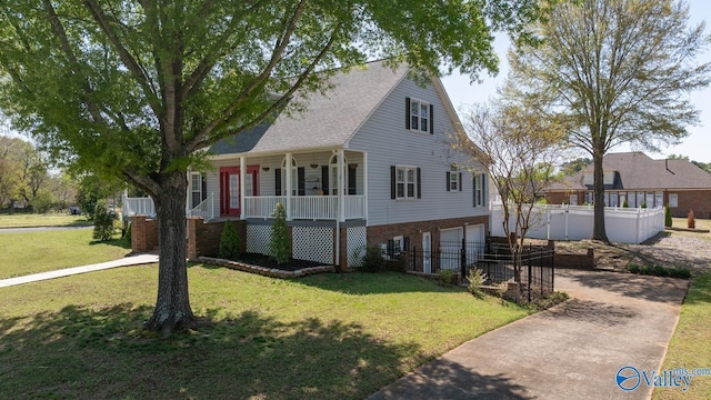 130 Kingswood Dr, Huntsville, AL 35806 - view of front of property with a front yard, covered porch, a garage, fence, and concrete driveway