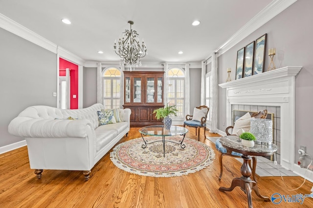 130 Kingswood Dr, Huntsville, AL 35806 - living room with wood finished floors, baseboards, ornamental molding, and recessed lighting