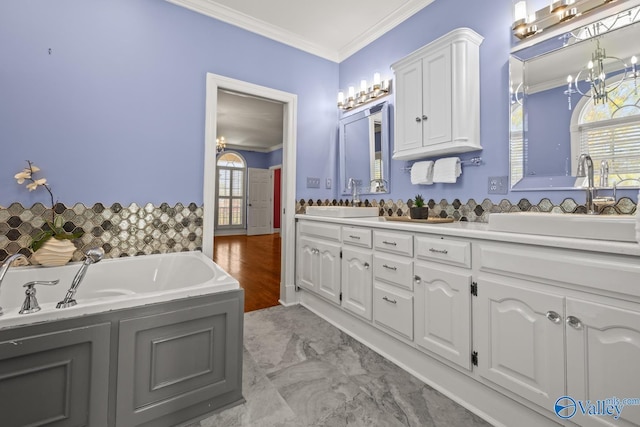 130 Kingswood Dr, Huntsville, AL 35806 - full bath featuring double vanity, a sink, and crown molding