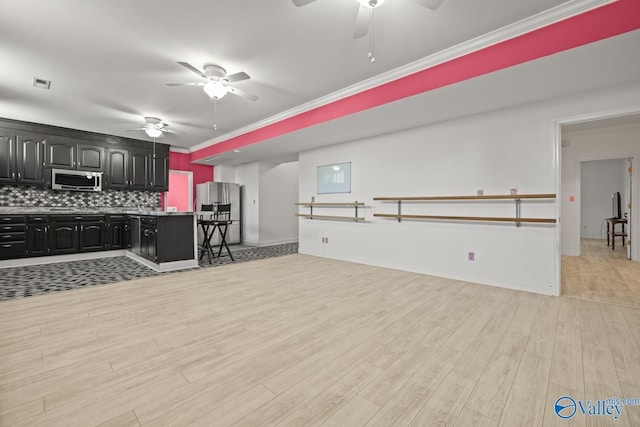 130 Kingswood Dr, Huntsville, AL 35806 - kitchen featuring open floor plan, visible vents, light wood-style floors, ceiling fan, and stainless steel appliances