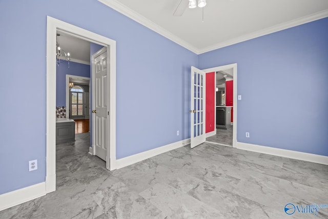 130 Kingswood Dr, Huntsville, AL 35806 - unfurnished room with crown molding, baseboards, marble finish floor, and ceiling fan with notable chandelier