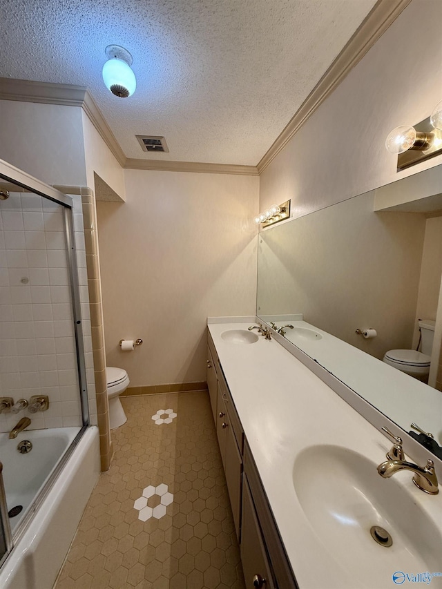 full bathroom with toilet, a textured ceiling, crown molding, vanity, and shower / bath combination with glass door