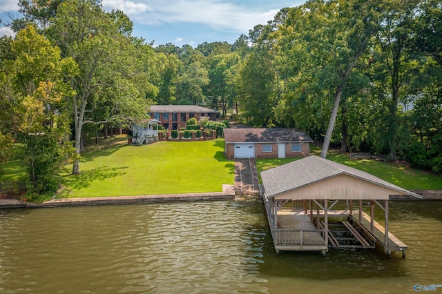 view of dock featuring a water view and a yard