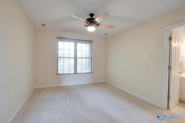 102 Twin Island Cir, Madison, AL 35758 - empty room with ceiling fan, light carpet, and baseboards