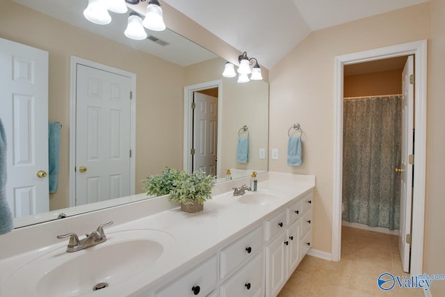 102 Twin Island Cir, Madison, AL 35758 - full bathroom with double vanity, tile patterned flooring, a chandelier, and baseboards