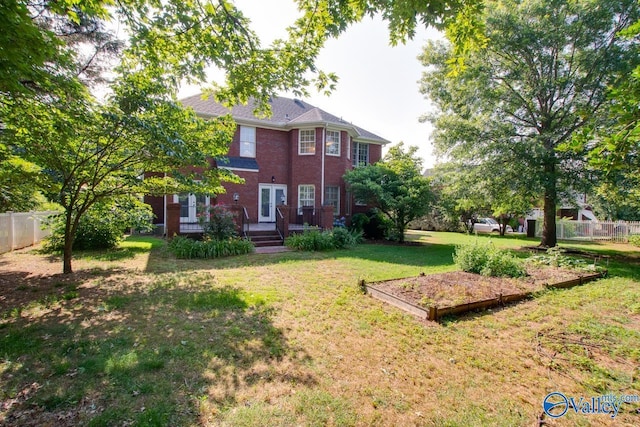 102 Twin Island Cir, Madison, AL 35758 - back of house featuring a deck and brick siding