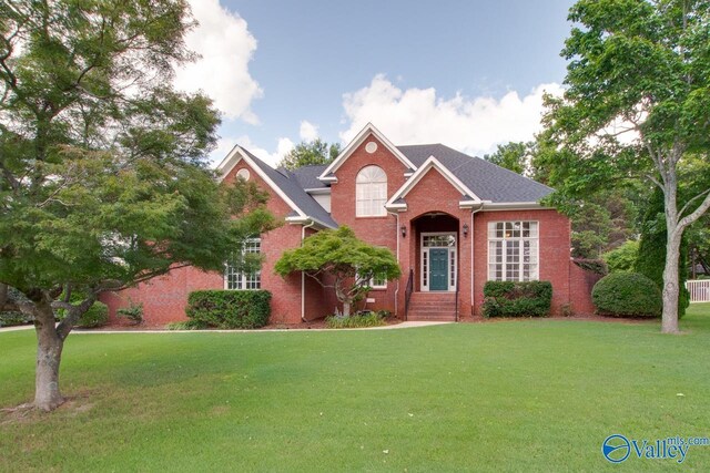 102 Twin Island Cir, Madison, AL 35758 - view of front facade with a front yard and brick siding
