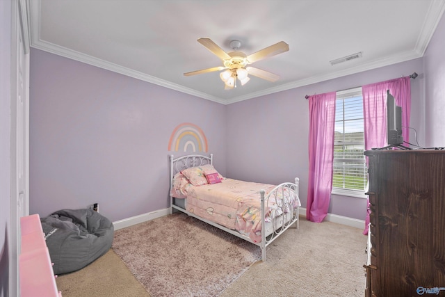 bedroom with visible vents, crown molding, baseboards, and carpet floors