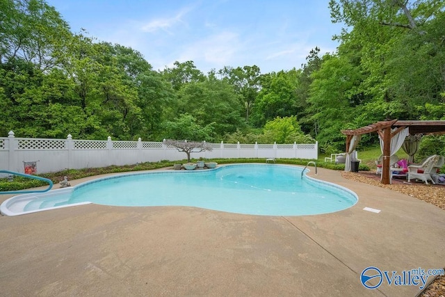 view of pool featuring a pergola, a patio, a fenced in pool, and a fenced backyard