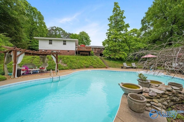 outdoor pool featuring a pergola