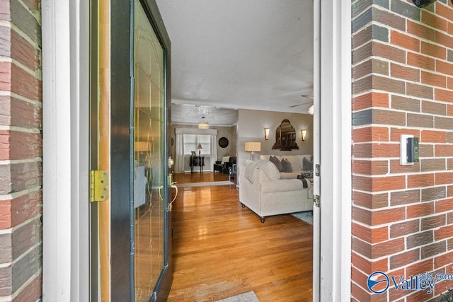 entrance to property with brick siding