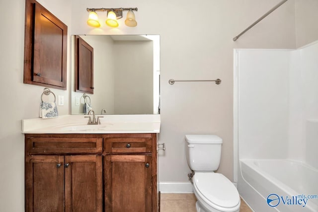 full bathroom featuring baseboards, vanity, toilet, and tile patterned floors