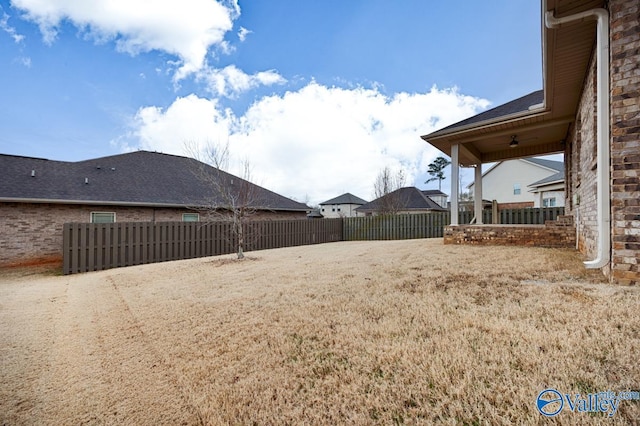 view of yard featuring a fenced backyard