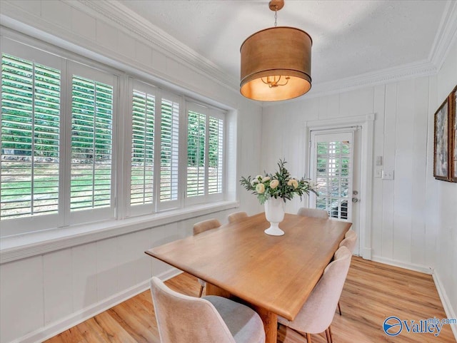 1901 Governors Dr SE, Huntsville, AL 35801 - dining room with healthy amount of natural light, ornamental molding, and light wood finished floors