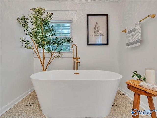 1901 Governors Dr SE, Huntsville, AL 35801 - full bathroom with a freestanding tub and tile patterned flooring