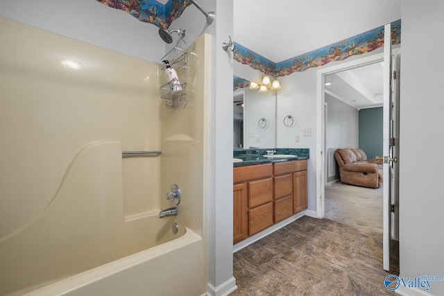 bathroom featuring a sink, double vanity, shower / tub combination, and baseboards
