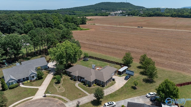 bird's eye view featuring a rural view and a mountain view