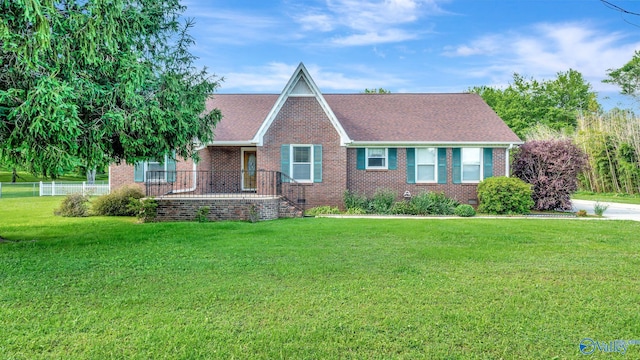565 Joe Quick Rd, Hazel Green, AL 35750 - view of front of house with brick siding and roof with shingles