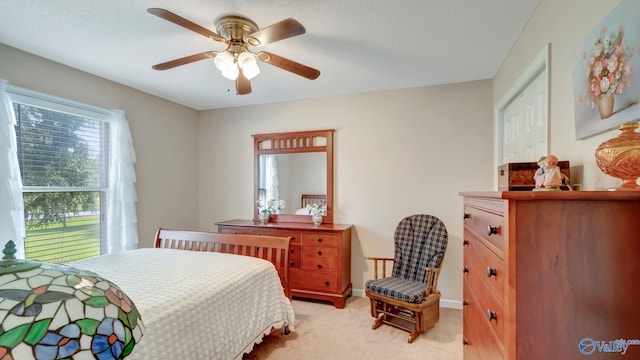 565 Joe Quick Rd, Hazel Green, AL 35750 - bedroom featuring light colored carpet and ceiling fan