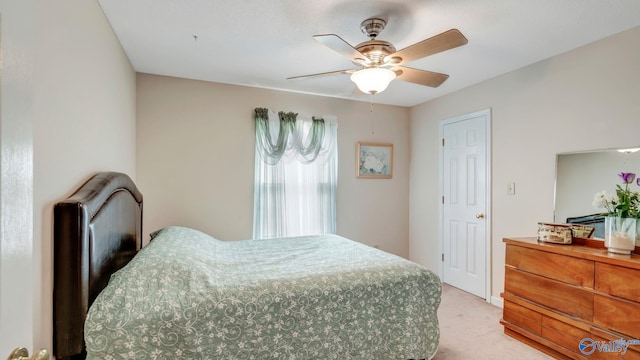 565 Joe Quick Rd, Hazel Green, AL 35750 - bedroom with light colored carpet and ceiling fan