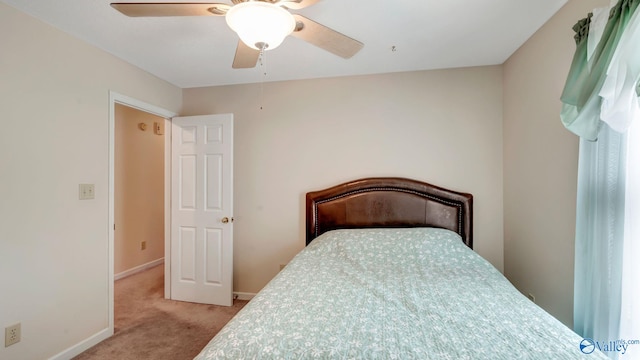 565 Joe Quick Rd, Hazel Green, AL 35750 - carpeted bedroom featuring a ceiling fan and baseboards