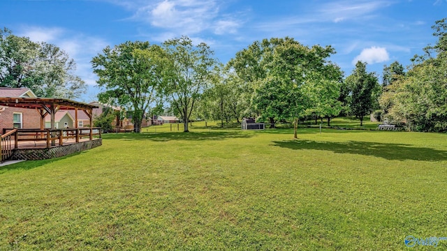 565 Joe Quick Rd, Hazel Green, AL 35750 - view of green lawn with a deck