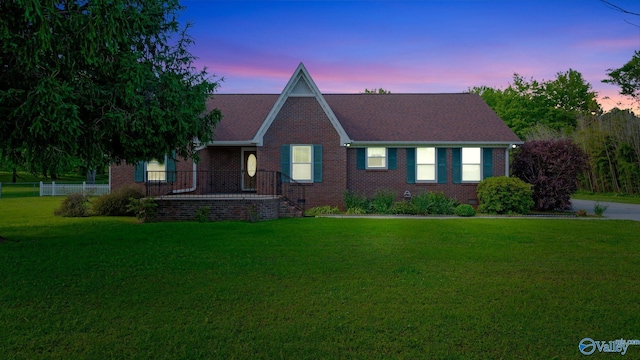 565 Joe Quick Rd, Hazel Green, AL 35750 - view of front of home featuring brick siding and a yard