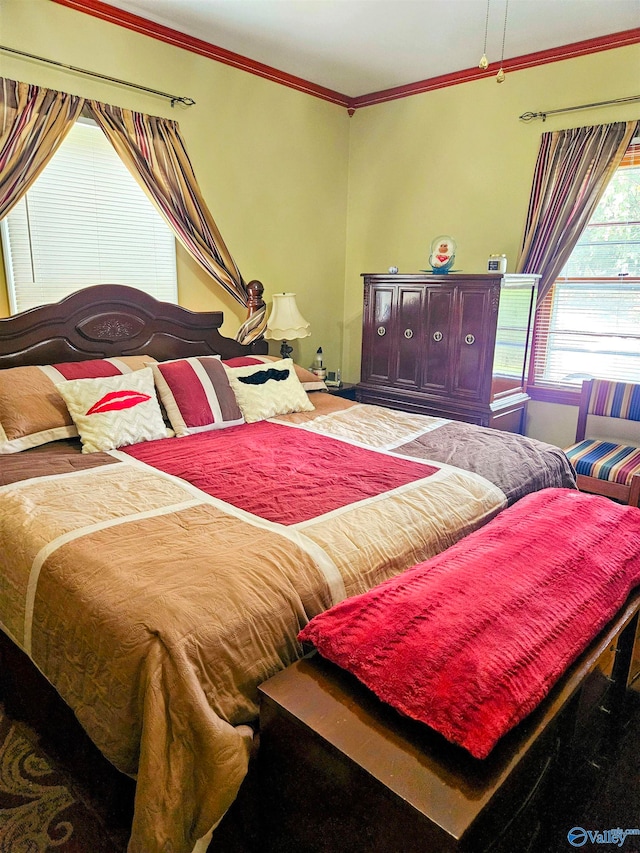 bedroom with crown molding