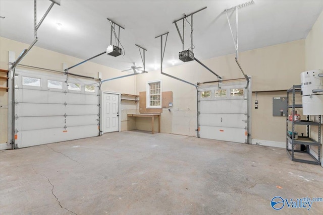 garage with electric panel and a garage door opener