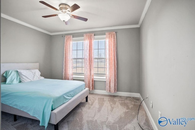 bedroom featuring light carpet, baseboards, ornamental molding, and ceiling fan