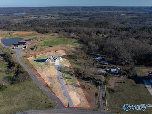 birds eye view of property featuring a rural view