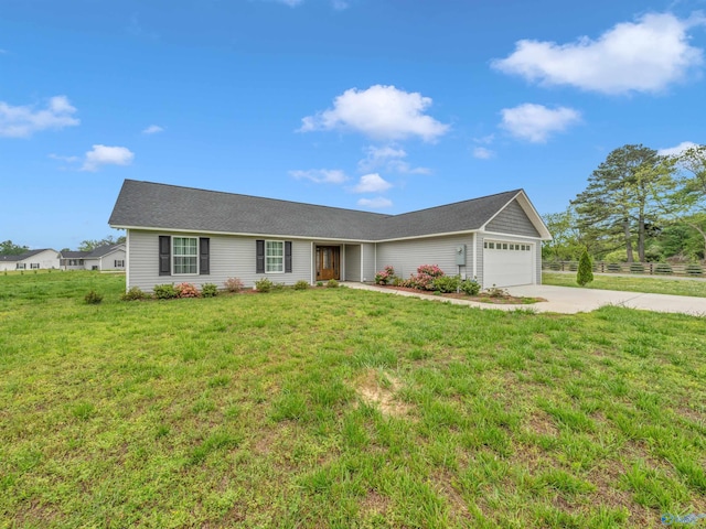 single story home with an attached garage, fence, a front yard, and concrete driveway