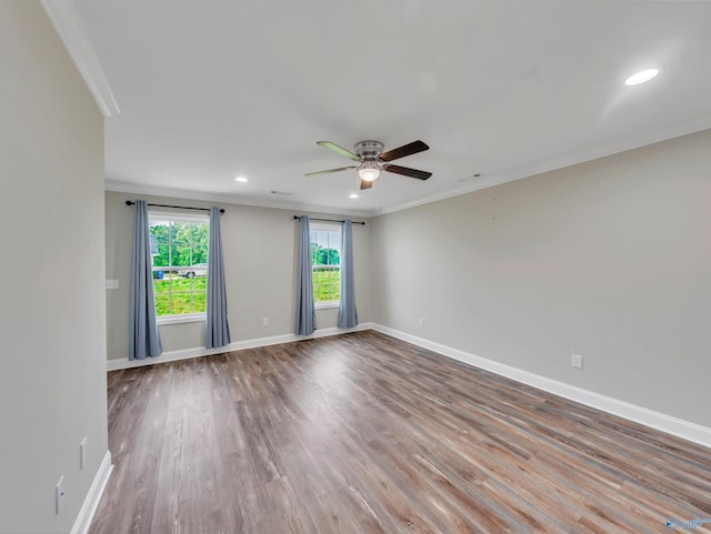 unfurnished room featuring ornamental molding, wood finished floors, baseboards, recessed lighting, and a ceiling fan